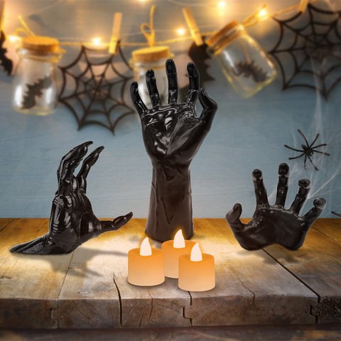 Creepy Reaching Hands With Lighted Candles Wall Mounted
